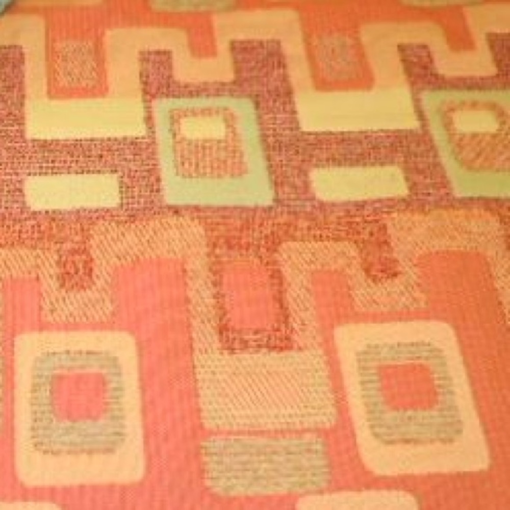 Calder Madmen Upholstery Fabric in Papaya